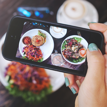 Restaurant food framed in a smart phone